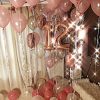 Σύνθεση μπαλονιών με αριθμούς ροζ-χρυσό και άσπρο περλέ